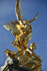 Gilded Winged Victory at the top of the Victoria Memorial, London.