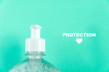 Container with alcohol gel on the light blue background