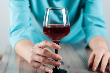 woman hand glass of wine
