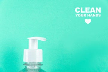 Container with alcohol gel on the light blue background