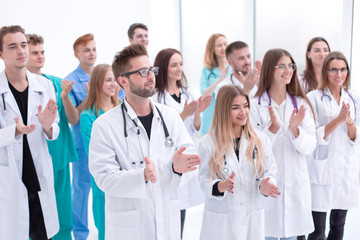 close up. confident doctors and interns standing together