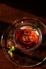 Red wine coctails with ice and rosemarine