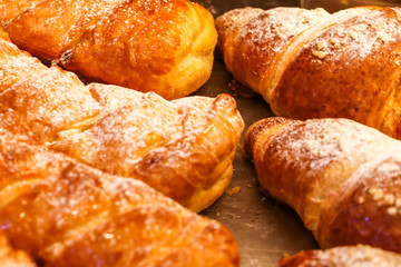 Freshly baked Croissants and sweet puff pastry buns