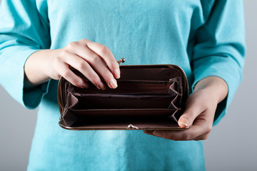 sad woman hand empty wallet