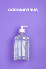 Container with alcohol gel on the light blue background