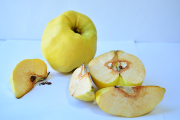 Juicy quince on a white background