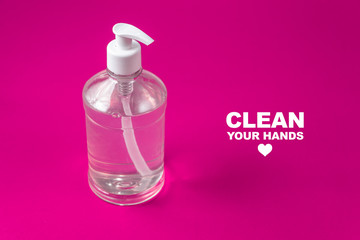 Container with alcohol gel on the red background