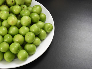 raw nectarine and sour plum,first sour fruits in spring,