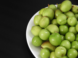 raw nectarine and sour plum,first sour fruits in spring,
