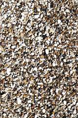 small pebbles with rounded stones close-up for background