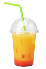 plastic glass with a straw and freshly squeezed juice from fruits of mango, banana and strawberry isolated on a white background. Fast food