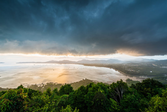 Kao Khad Viewpoint of Phuket city at sunset time under rainstorm, Phuket, Thailand