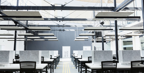 Modern office interior with wrapped in cover computers