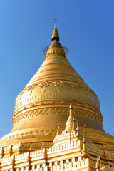 view to the Shwezigon pagoda or shwezigon paya, a Buddhist temple located in Nyaung-u, near Bagan,...