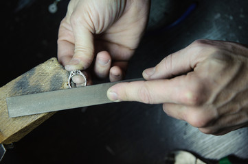 Surface treatment of jewelry rings in the manufacturing process