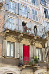 Fototapeta na wymiar detail of the facade of the house in italy milan