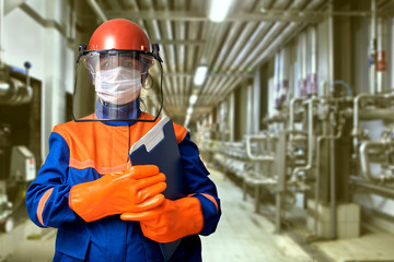Female electrical engineer with protective gear.