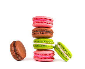 colored macaroons on a white background