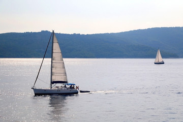 Sailing boat on the sea in southern Dalmatia region in Croatia. Beautiful landscape and bright summer day.