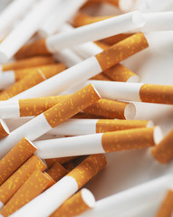 Cigarette filter tubes. Close up of a smoking cigarettes