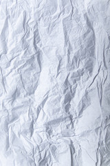 Paper texture. White crumpled paper background.