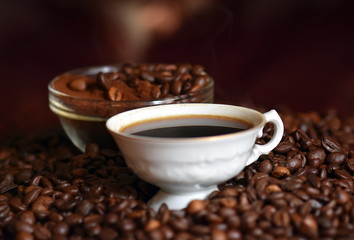 cup of coffee with beans