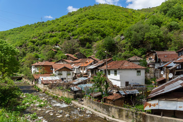 Fototapeta na wymiar Old houses in village of Pirin, Bulgaria