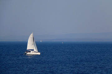 Fototapeta premium Sailing boat on the sea in southern Dalmatia region in Croatia. Beautiful landscape and bright summer day.