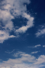 Naklejka na ściany i meble Blurry image of Blue Sky And White Clouds. Horizontal Shot Of A Beautiful Sky Background. Heaven, Nature, Landscapes Concept.