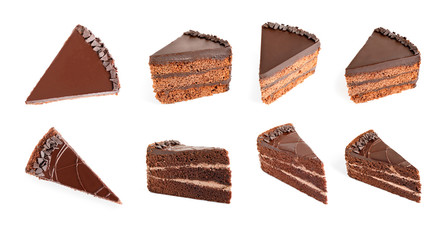 Set with different chocolate cake pieces on white background