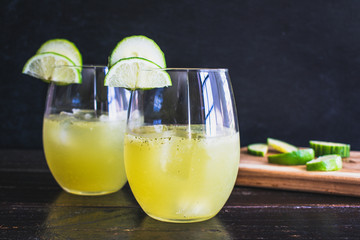 Summer Breeze Cocktail with Garnish: Savory cocktails made with cucumber, lime, mint, and prosecco