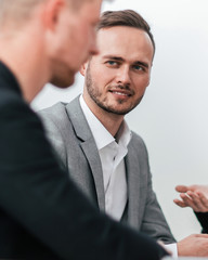 group of young people discussing ideas for their startup