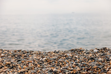 natural background. rocks and pebbles on the beach sea