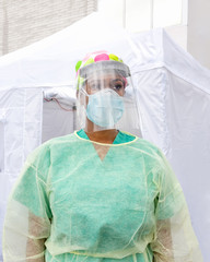 Frontline Epidemic Medical providers in Protective Gear Caring for Patients.