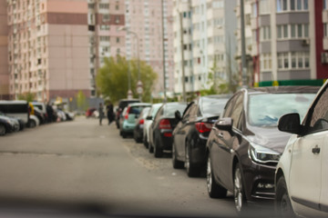 Cars parked outside in the city