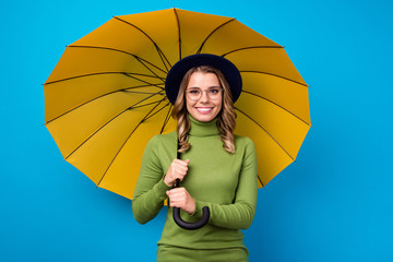 Photo of cheerful funny curly lady big umbrella walk street rainy warm spring weather good mood...