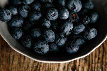 large bog whortleberry in a plate on the table. Kitchen