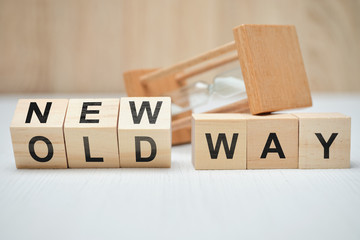 Concept change old way is new on wooden blocks.