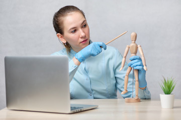 The doctor conducts an online broadcast of a lecture on headaches.