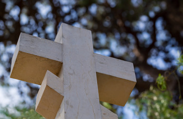 Christian cross isolated in blue sky background. Church Roof with a cross. Church building roof...