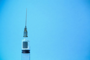 Syringe with a chip. The concept of the theory of conspiracy and implantation of vaccinated chips....