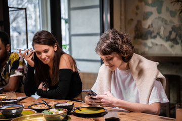leisure, technology and people concept - group of happy internat