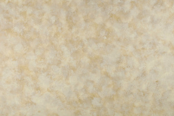 Tan and beige stone textured background. Parchment paper background