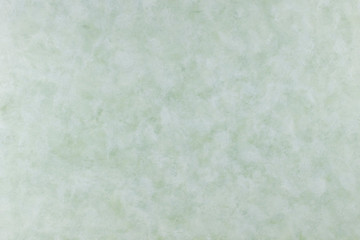 Green granite textured background. Mint green wallpaper. light Green parchment paper