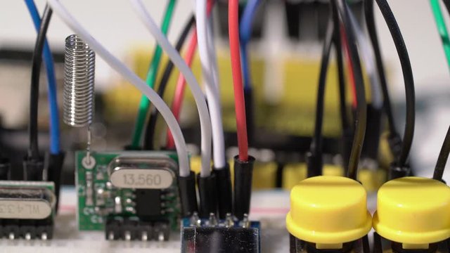 Breadboard prototyping with microcontroller arduino components and wire jumpers