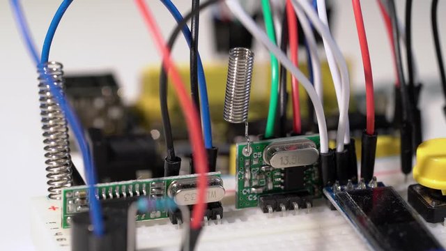 Breadboard prototyping with microcontroller arduino components and wire jumpers