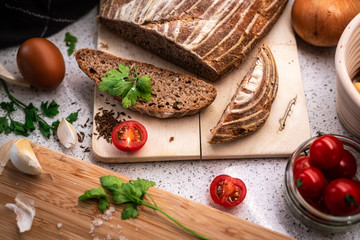 Background with bread, rolls, vegetables and herbs, 