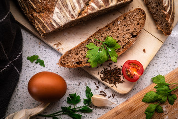 Background with bread, rolls, vegetables and herbs, 
