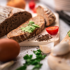 Background with bread, rolls, vegetables and herbs, 