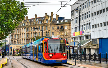 Plakat City tram at Cathedral station in Sheffield, England